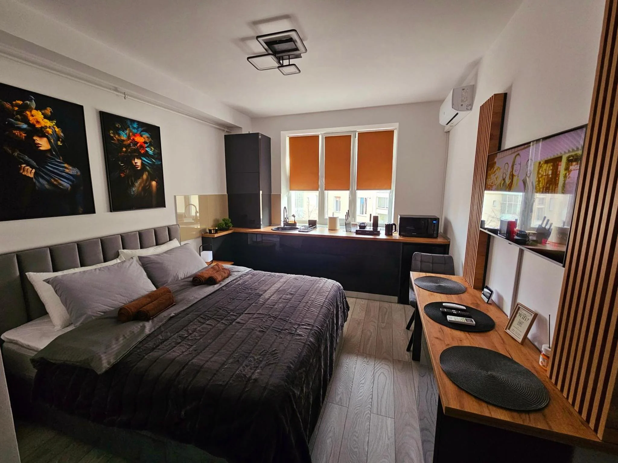 Un pat sau paturi într-o cameră la Modern Studio 3